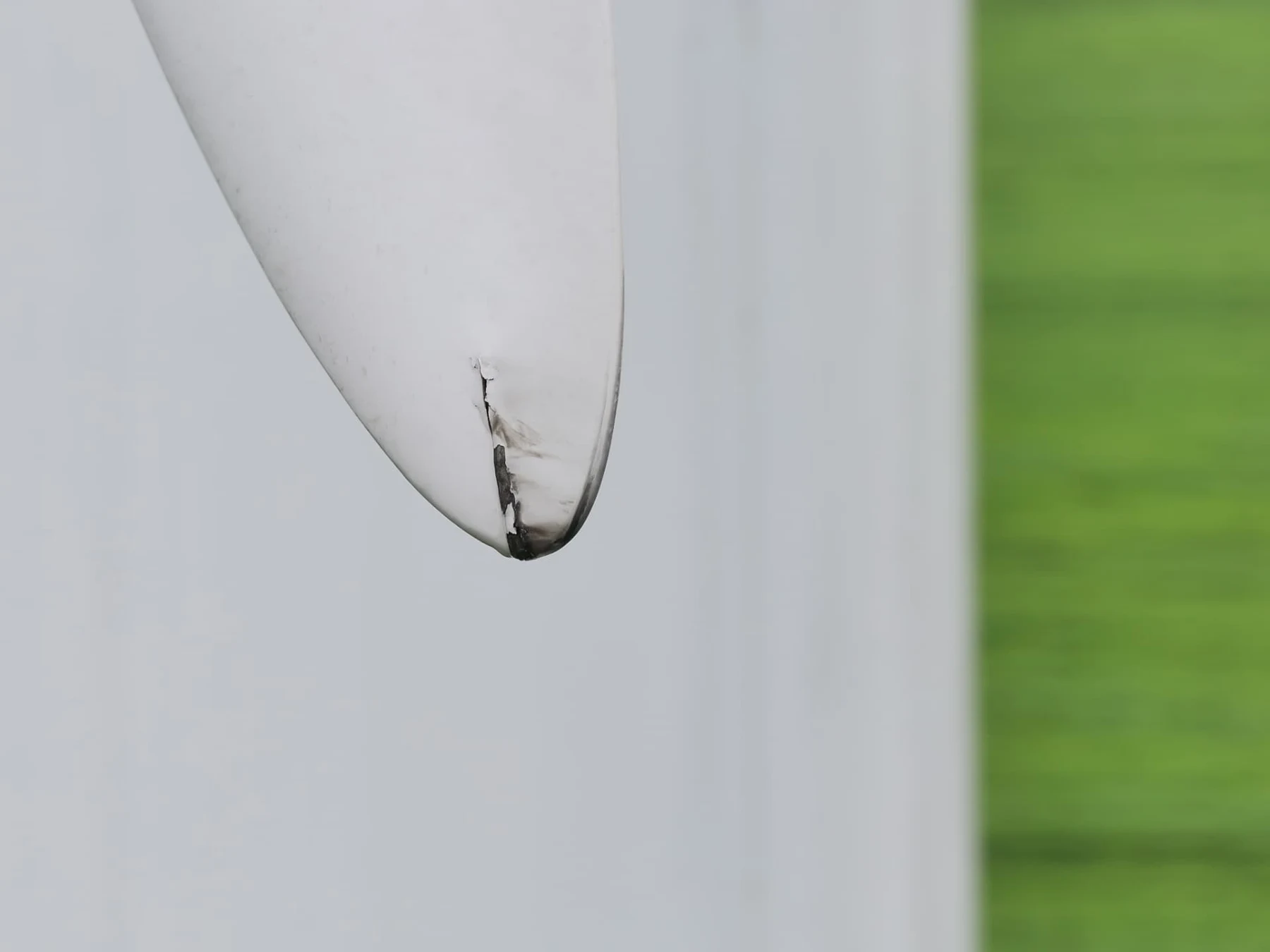 Visible crack and coating loss at the blade tip