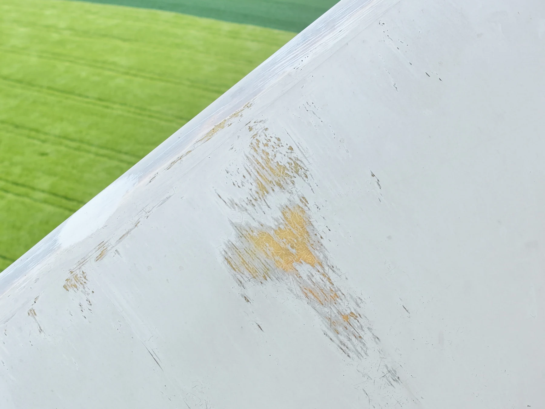 Close-up of surface coating loss